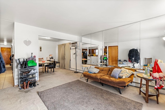 carpeted living area with a wall unit AC