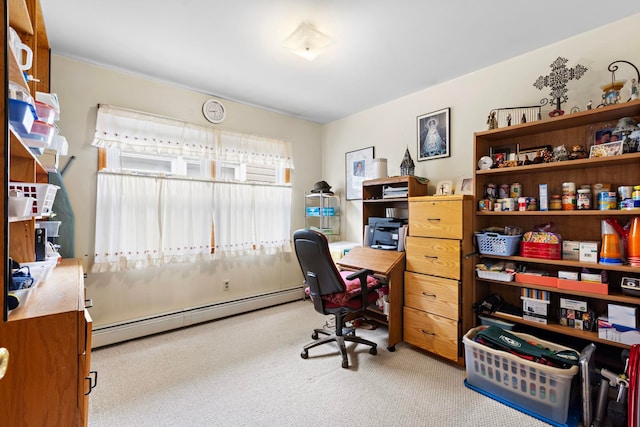 carpeted home office with a baseboard heating unit