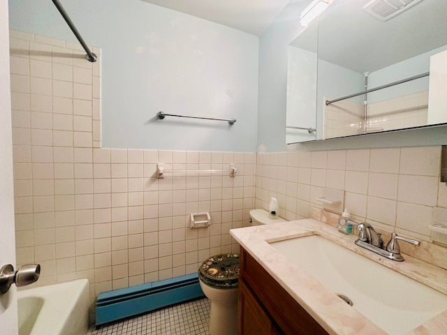 full bathroom featuring tile walls, tile patterned floors, vanity, a baseboard heating unit, and toilet