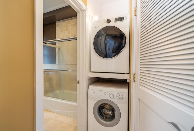 930 Park Ave Unit 3, Hoboken, NJ 07030 - laundry area with stacked washer / drying machine and tile patterned floors