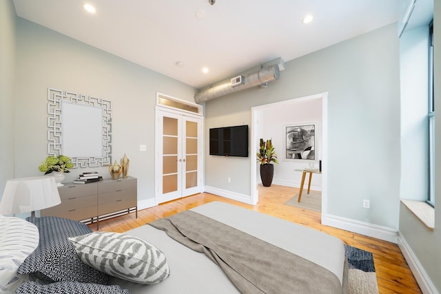 930 Park Ave Unit 3, Hoboken, NJ 07030 - bedroom featuring french doors, wood finished floors, and recessed lighting