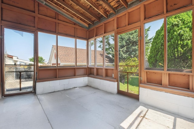 1508 77th St, North Bergen, NJ 07047 - unfurnished sunroom with concrete flooring and vaulted ceiling