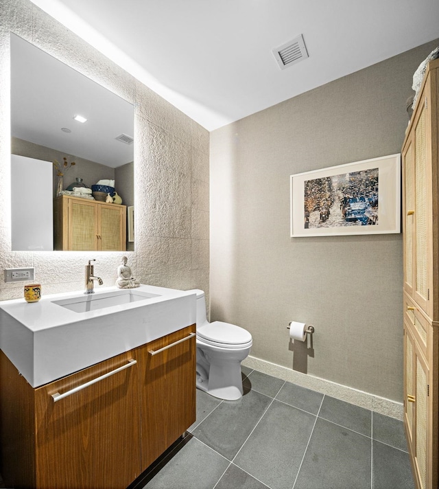 75 Park Ln S Unit 706, Jersey City, NJ 07310 - bathroom with toilet, tile patterned floors, visible vents, and vanity