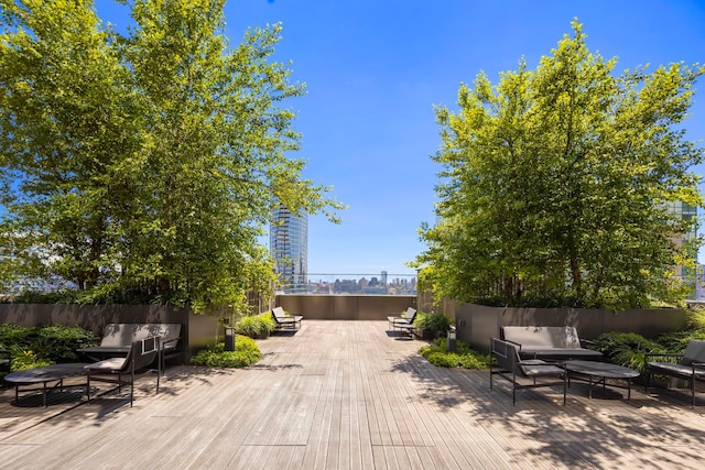 75 Park Ln S Unit 706, Jersey City, NJ 07310 - wooden deck featuring outdoor lounge area