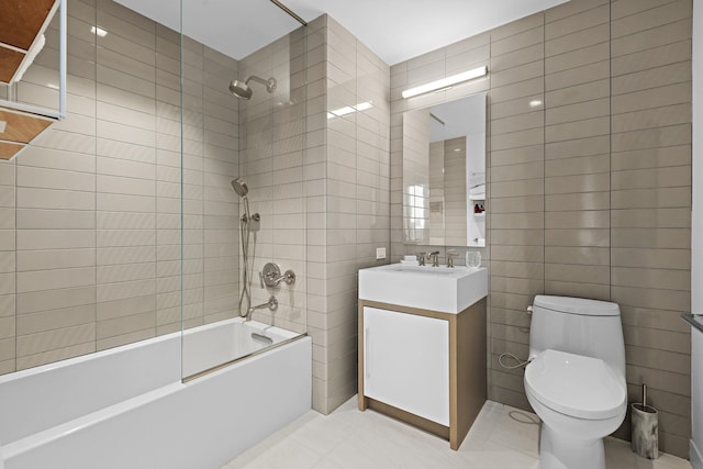75 Park Ln S Unit 706, Jersey City, NJ 07310 - bathroom with bathing tub / shower combination, vanity, toilet, and tile walls