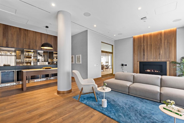 75 Park Ln S Unit 706, Jersey City, NJ 07310 - living area with a lit fireplace and wood finished floors