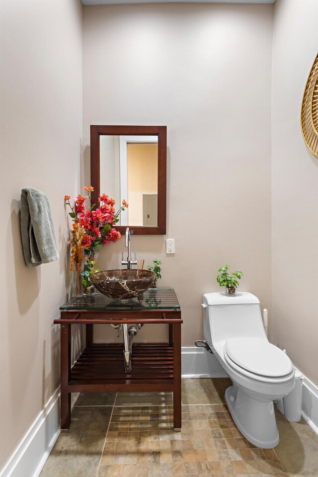 297 Montgomery St Unit 2, Jersey City, NJ 07302 - half bathroom featuring toilet and vanity