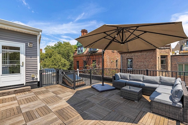 297 Montgomery St Unit 2, Jersey City, NJ 07302 - wooden deck featuring an outdoor living space