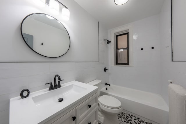 full bath featuring tile walls, radiator, vanity, toilet, and bathing tub / shower combination