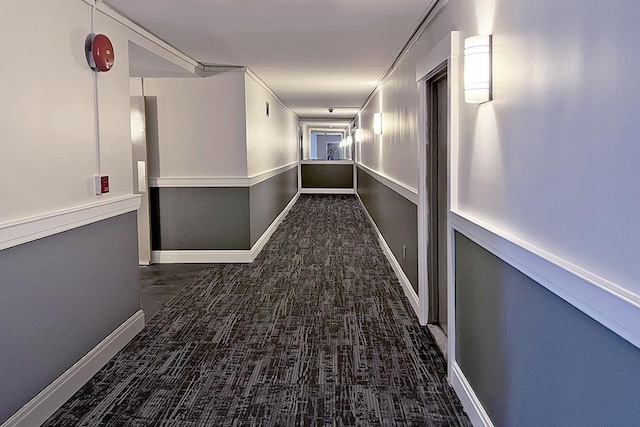 corridor with dark carpet