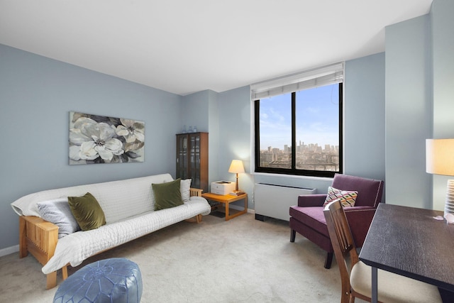 carpeted living room with radiator