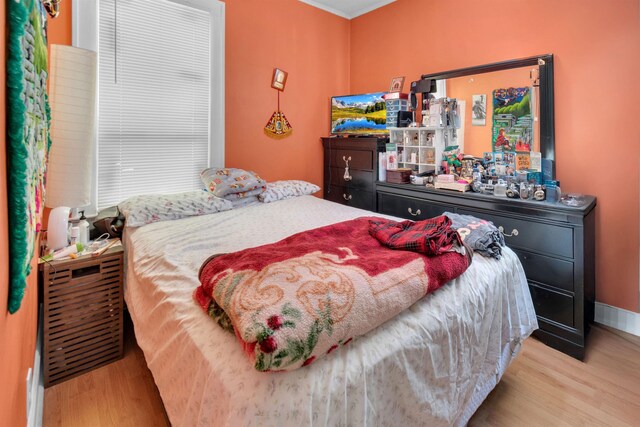 280 Highland Ave Unit 3, Kearny, NJ 07032 - bedroom featuring wood finished floors and crown molding