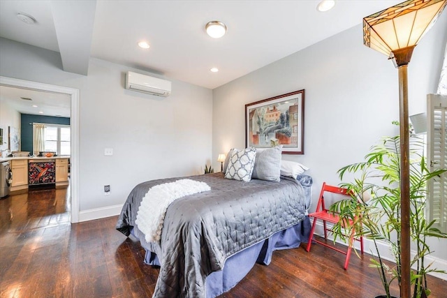 351 5th St Unit 3, Jersey City, NJ 07302 - bedroom with a wall unit AC, baseboards, wood finished floors, and recessed lighting