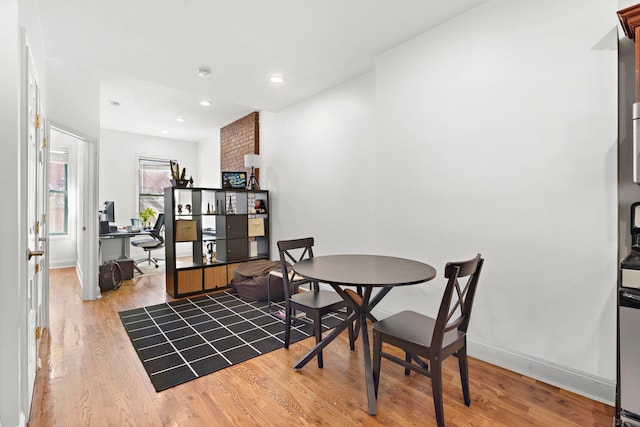 dining room featuring light hardwood / wood-style floors