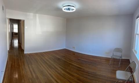 empty room featuring wood finished floors