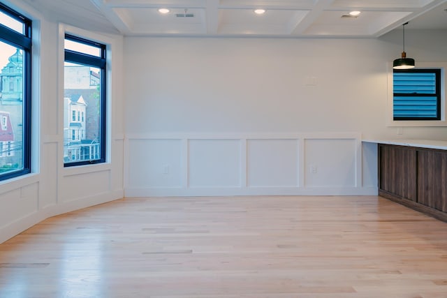 141 Sherman Ave Unit 2, Jersey City, NJ 07307 - spare room featuring a decorative wall, beam ceiling, coffered ceiling, light wood-style floors, and recessed lighting