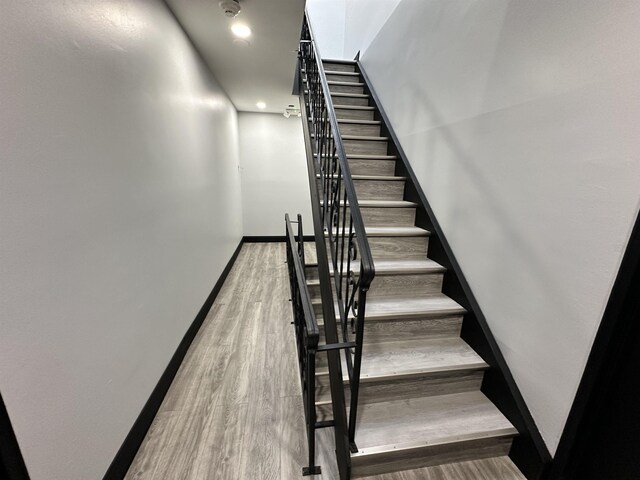 552 38th St Unit 3, Union City, NJ 07087 - staircase featuring wood finished floors and baseboards