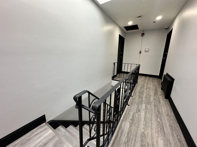 552 38th St Unit 3, Union City, NJ 07087 - hallway with an upstairs landing, light wood finished floors, and recessed lighting