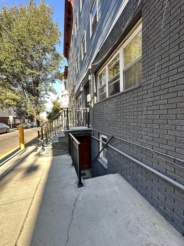 552 38th St Unit 3, Union City, NJ 07087 - view of property exterior featuring brick siding
