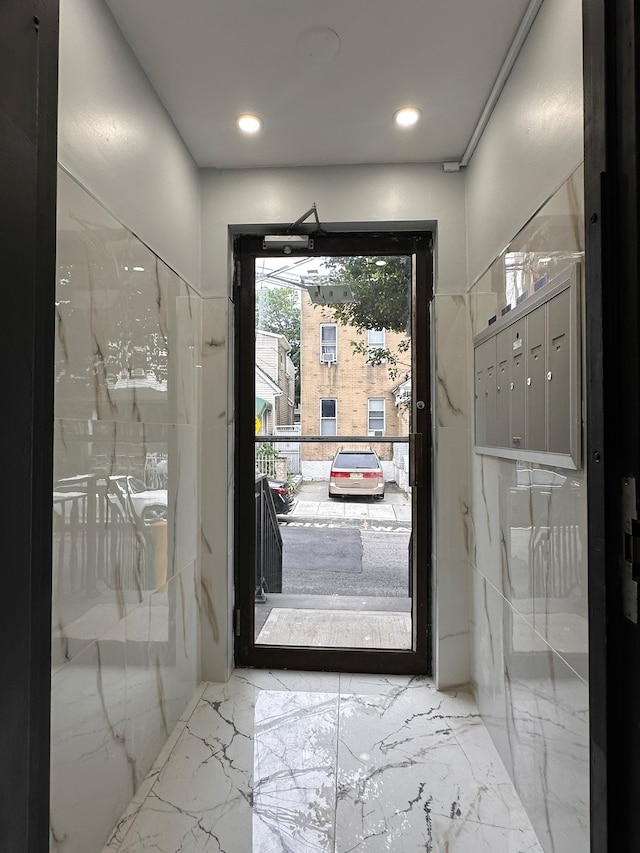 552 38th St Unit 3, Union City, NJ 07087 - entrance foyer with marble tiled floors, mail area, and recessed lighting