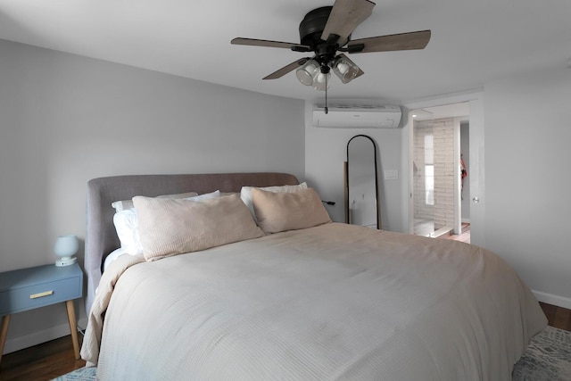 123 Willow Ter, Hoboken, NJ 07030 - bedroom with a wall mounted air conditioner, wood finished floors, and a ceiling fan