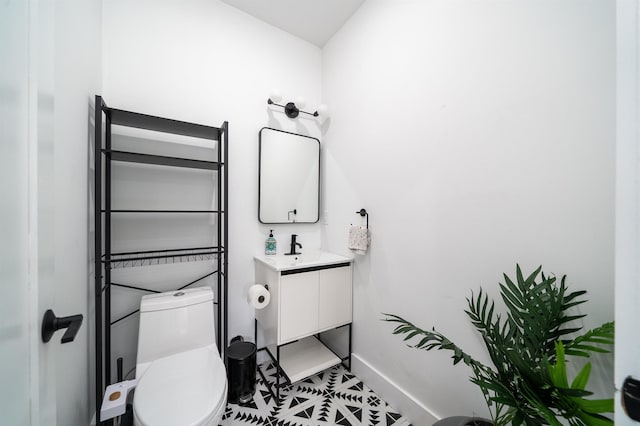 109 Poplar St Unit 1, Jersey City, NJ 07307 - half bathroom with baseboards, vanity, and toilet