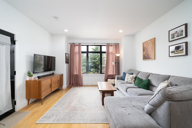 109 Poplar St Unit 1, Jersey City, NJ 07307 - living area featuring light wood-type flooring, baseboards, and recessed lighting
