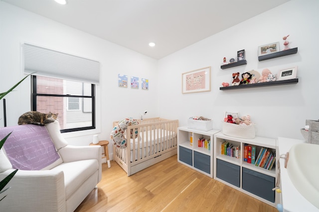109 Poplar St Unit 1, Jersey City, NJ 07307 - bedroom with light wood-style floors and recessed lighting