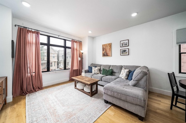 109 Poplar St Unit 1, Jersey City, NJ 07307 - living area with light wood-style floors, baseboards, and recessed lighting