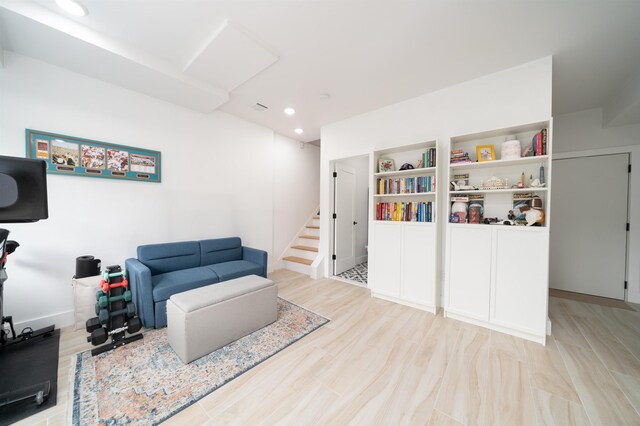 109 Poplar St Unit 1, Jersey City, NJ 07307 - sitting room with stairs, recessed lighting, baseboards, and wood finished floors