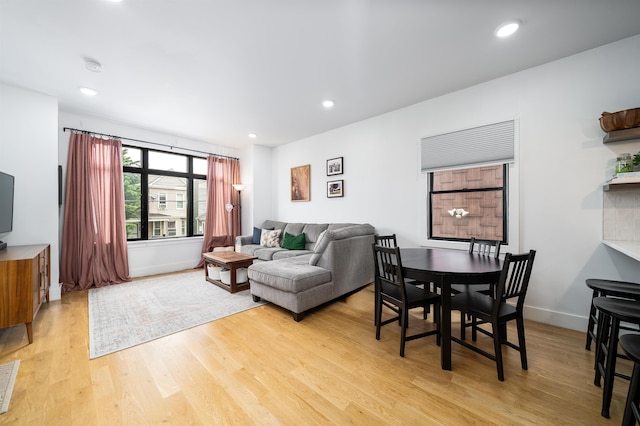109 Poplar St Unit 1, Jersey City, NJ 07307 - living room featuring light wood-style flooring, baseboards, and recessed lighting