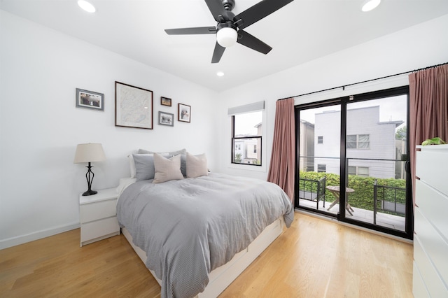 109 Poplar St Unit 1, Jersey City, NJ 07307 - bedroom with multiple windows, access to exterior, light wood-style flooring, recessed lighting, and baseboards