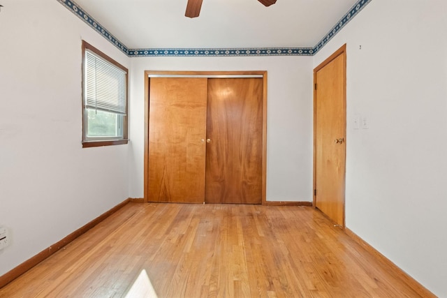 22 W 34th St Unit G, Bayonne, NJ 07002 - unfurnished bedroom featuring light wood-type flooring, a closet, baseboards, and ceiling fan