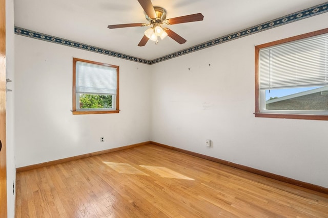 22 W 34th St Unit G, Bayonne, NJ 07002 - unfurnished room with light wood-style floors, baseboards, and ceiling fan