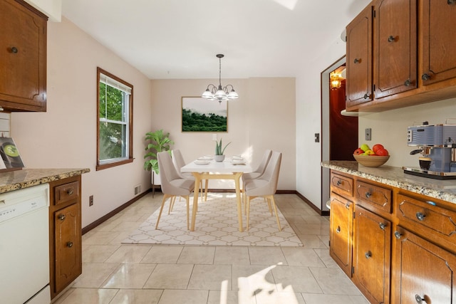 22 W 34th St Unit G, Bayonne, NJ 07002 - dining room with a chandelier, baseboards, and light tile patterned floors