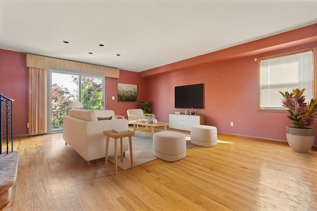 22 W 34th St Unit G, Bayonne, NJ 07002 - living area featuring light wood-type flooring and baseboards