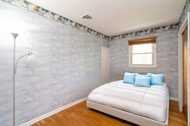 151 Mount Pleasant Ave, Dover Town, NJ 07801 - bedroom featuring wood finished floors, baseboards, and wallpapered walls