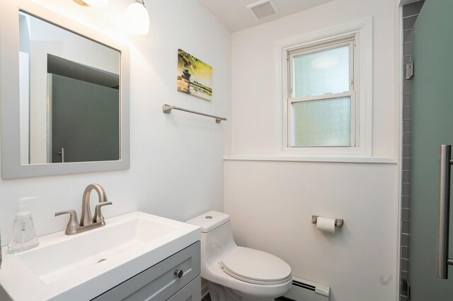151 Mount Pleasant Ave, Dover Town, NJ 07801 - bathroom with baseboard heating, vanity, and toilet
