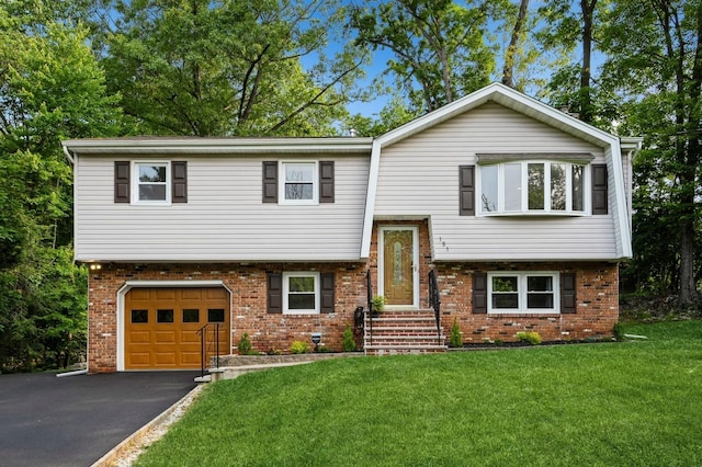 151 Mount Pleasant Ave, Dover Town, NJ 07801 - view of front of property featuring brick siding, driveway, a front yard, and an attached garage
