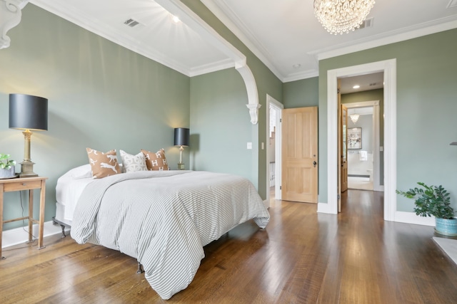 254 4th St, Jersey City, NJ 07302 - bedroom with wood finished floors, a chandelier, baseboards, and crown molding