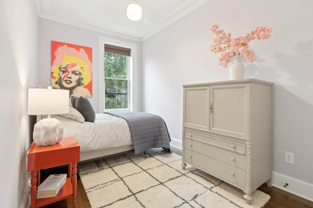 254 4th St, Jersey City, NJ 07302 - bedroom featuring ornamental molding, baseboards, and wood finished floors