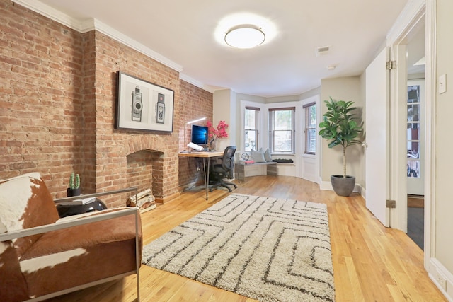 254 4th St, Jersey City, NJ 07302 - office area with wood finished floors, baseboards, ornamental molding, and brick wall