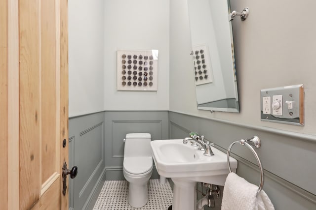 254 4th St, Jersey City, NJ 07302 - bathroom featuring toilet and tile patterned floors