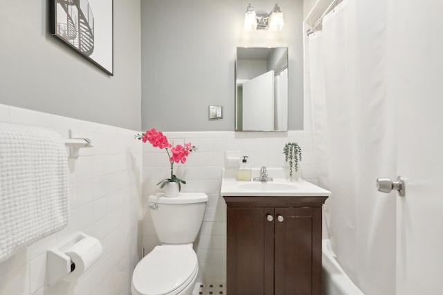 254 4th St, Jersey City, NJ 07302 - full bath with toilet, tile walls, wainscoting, and vanity