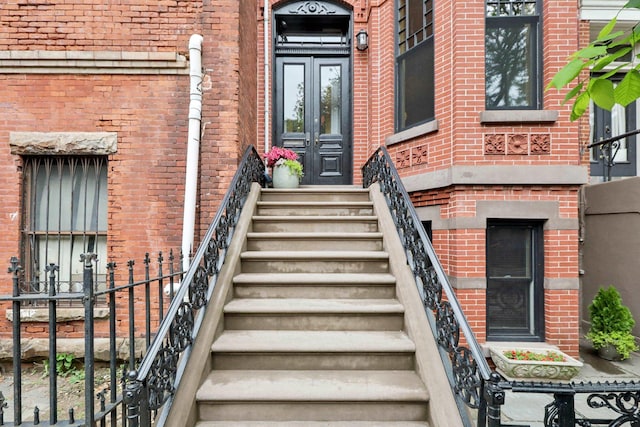 254 4th St, Jersey City, NJ 07302 - view of exterior entry with brick siding and french doors