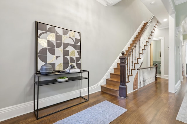 254 4th St, Jersey City, NJ 07302 - entryway with stairway, wood finished floors, baseboards, and crown molding