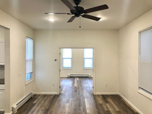549 Pavonia Ave Unit 1 & 2, Jersey City, NJ 07306 - spare room with a baseboard radiator, a baseboard heating unit, dark wood-type flooring, and ceiling fan