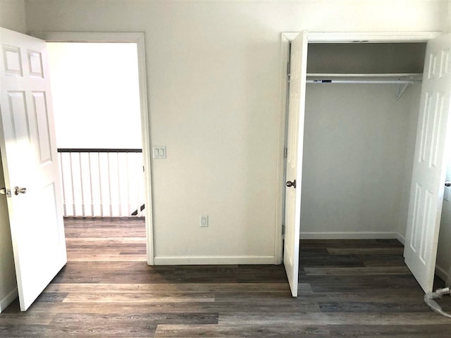 549 Pavonia Ave Unit 1 & 2, Jersey City, NJ 07306 - unfurnished bedroom with wood finished floors, a closet, and baseboards