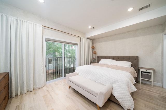 549 Palisade Ave Unit 2, Jersey City, NJ 07307 - bedroom featuring access to exterior, wood finished floors, and recessed lighting