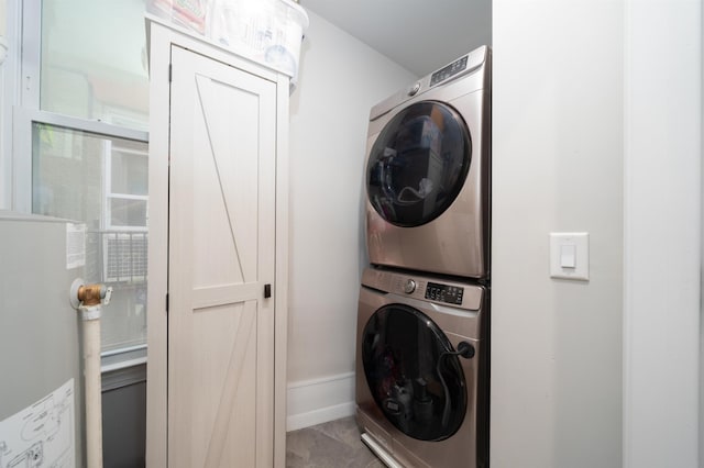 549 Palisade Ave Unit 2, Jersey City, NJ 07307 - laundry room featuring stacked washer and clothes dryer and water heater